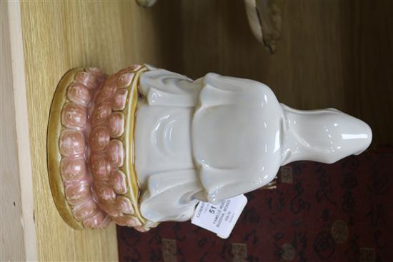 A cased Famille rose Buddha, boxed